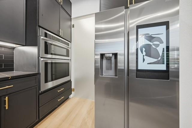 522 South Clark Road Cedar Hill, TX 75104 - Photo 9 of 31 a kitchen with stainless steel appliances granite countertop a refrigerator and a stove