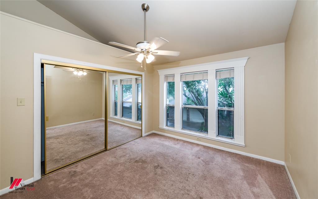 300 Pierremont Road, Unit 40 Shreveport, LA 71106 - Photo 26 of 34 Bedroom #3 with wall of windows and large closet.