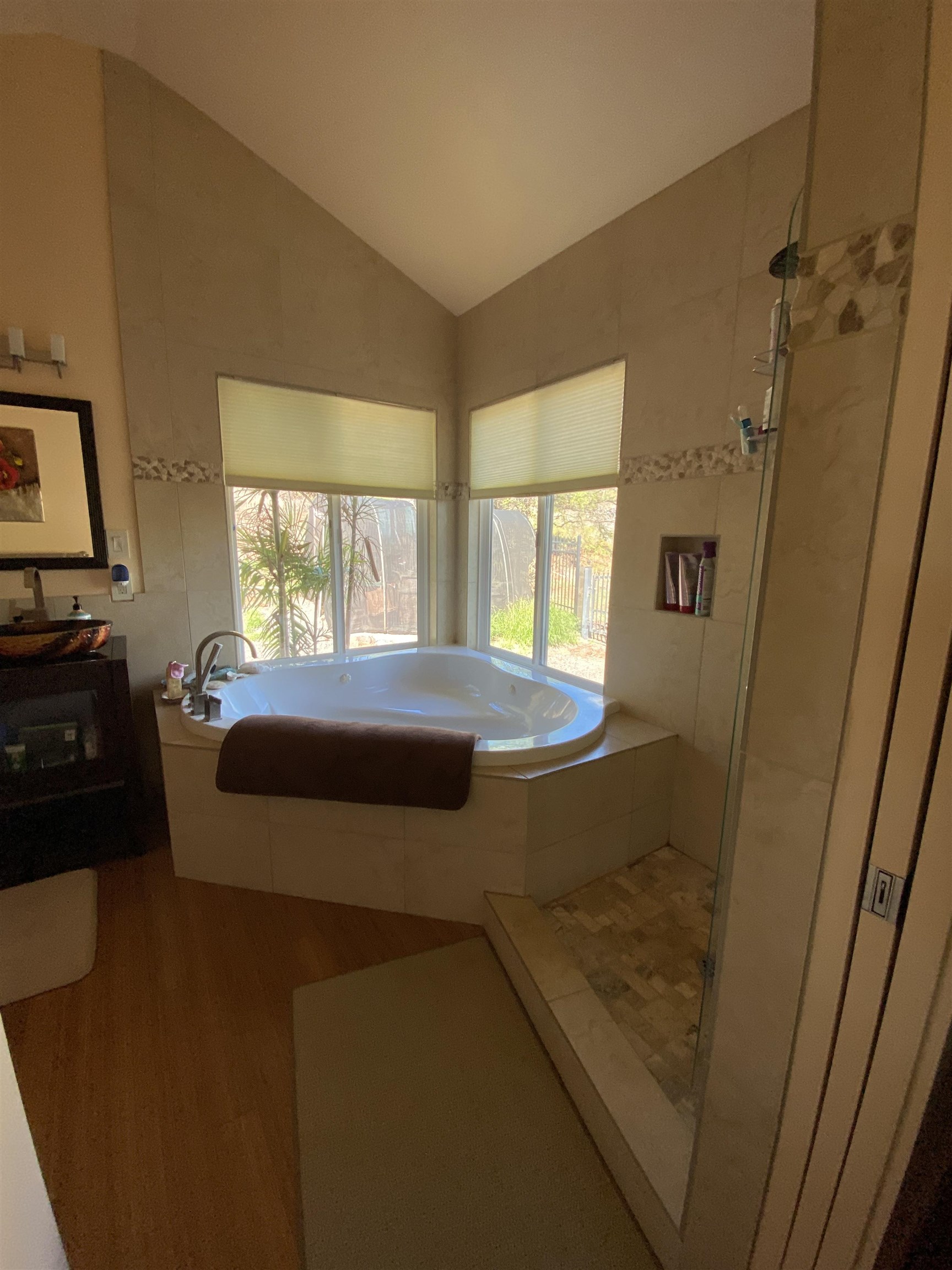 170 Ulua Road Kaunakakai, HI 96748 - Photo 15 of 38 a bedroom with a bed and a large window