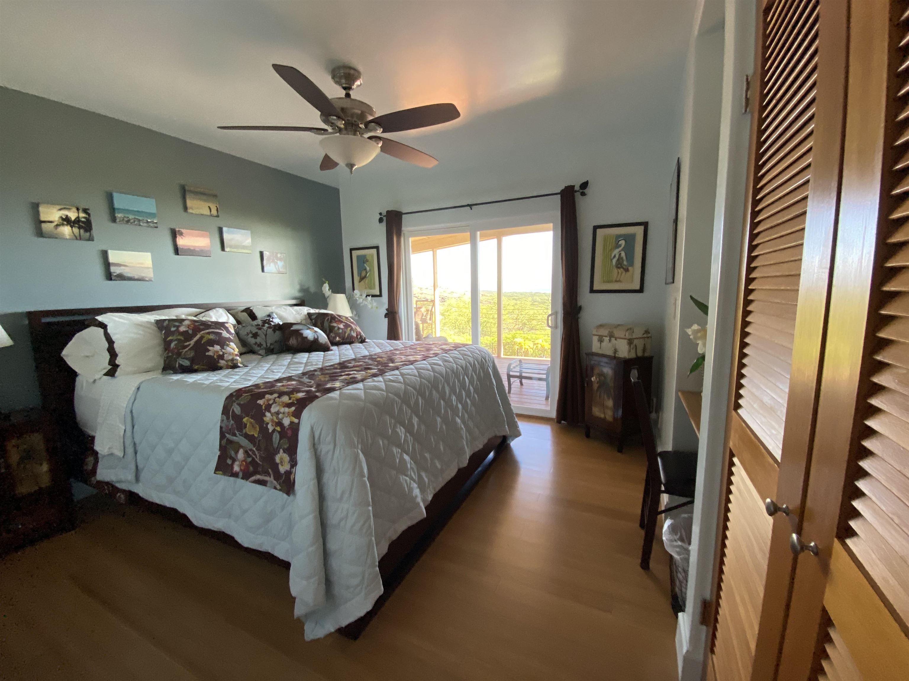 170 Ulua Road Kaunakakai, HI 96748 - Photo 17 of 38 a spacious bedroom with a bed and window