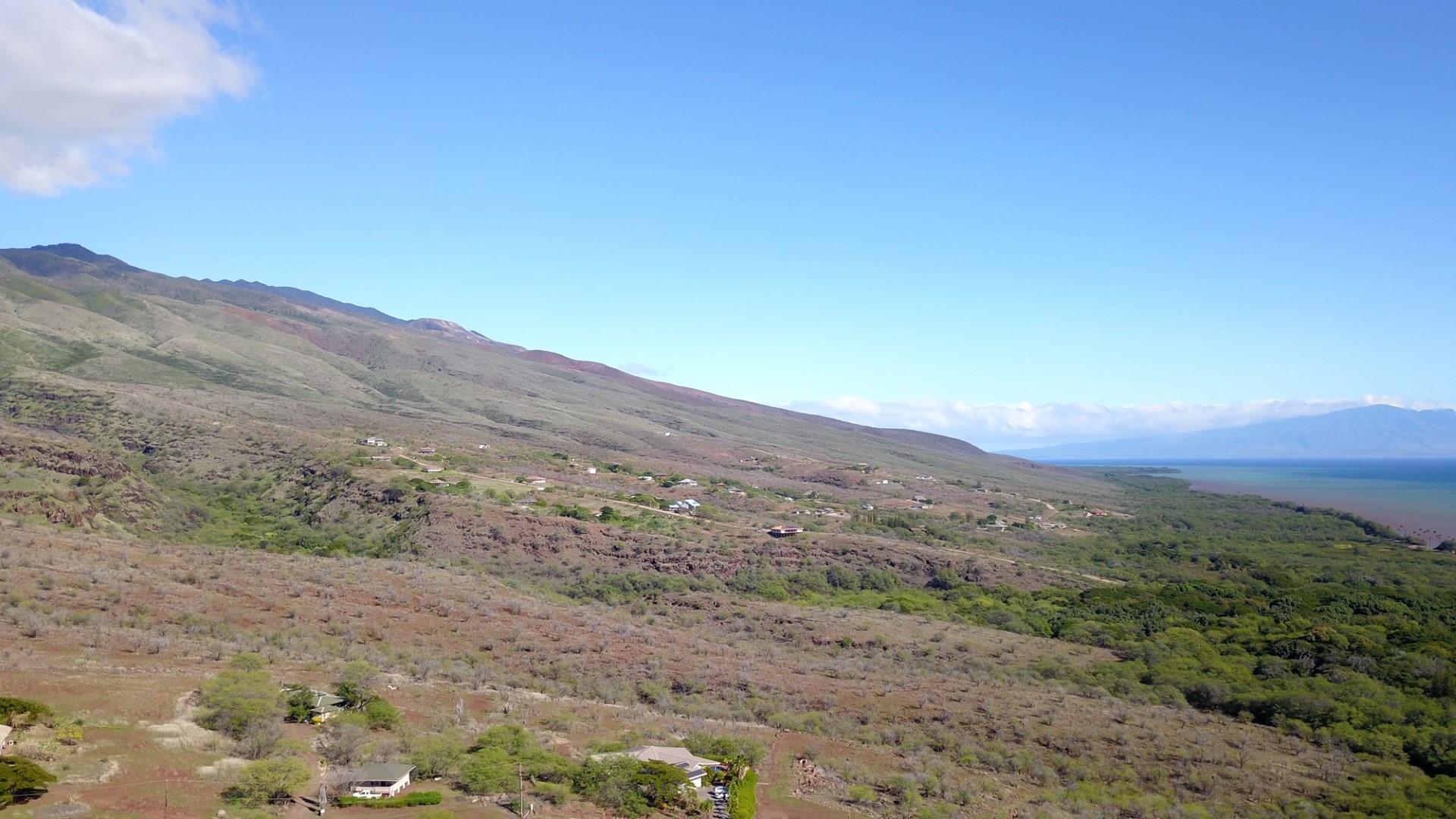 170 Ulua Road Kaunakakai, HI 96748 - Photo 34 of 38 a view of a mountain range with trees in the background