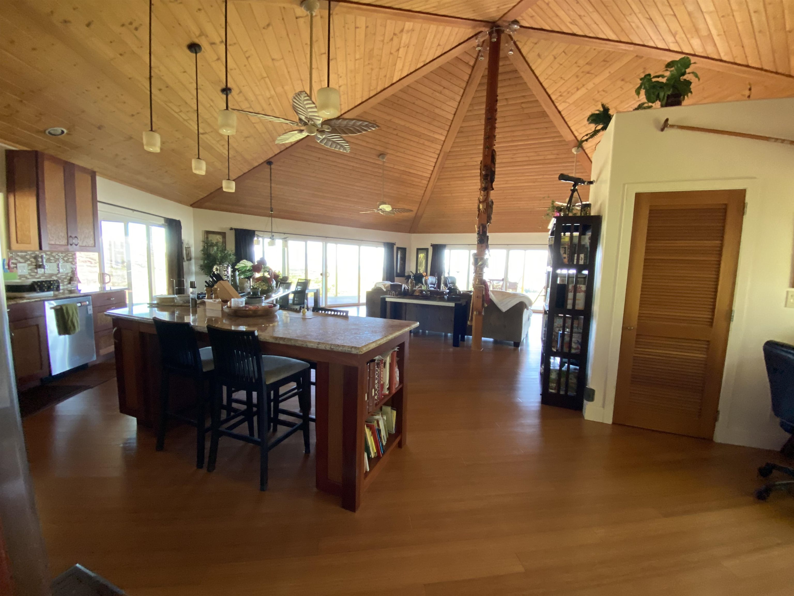 170 Ulua Road Kaunakakai, HI 96748 - Photo 6 of 38 a dining hall with stainless steel appliances a table and chairs