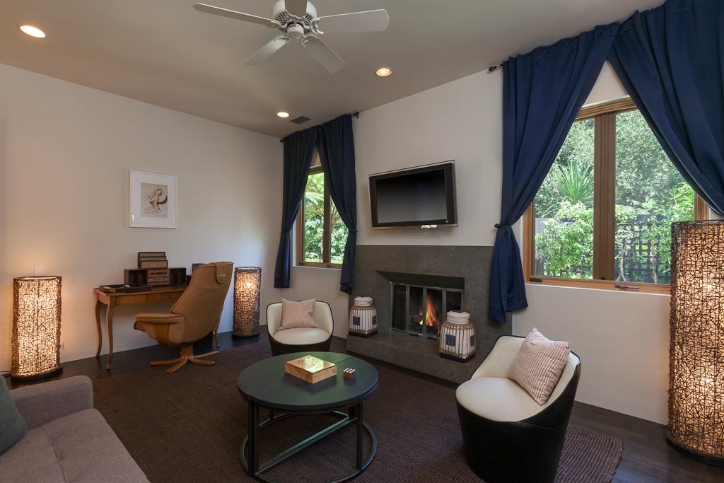 875 Rockbridge Road Montecito, CA 93108 - Photo 3 of 12 a living room with furniture fireplace and window