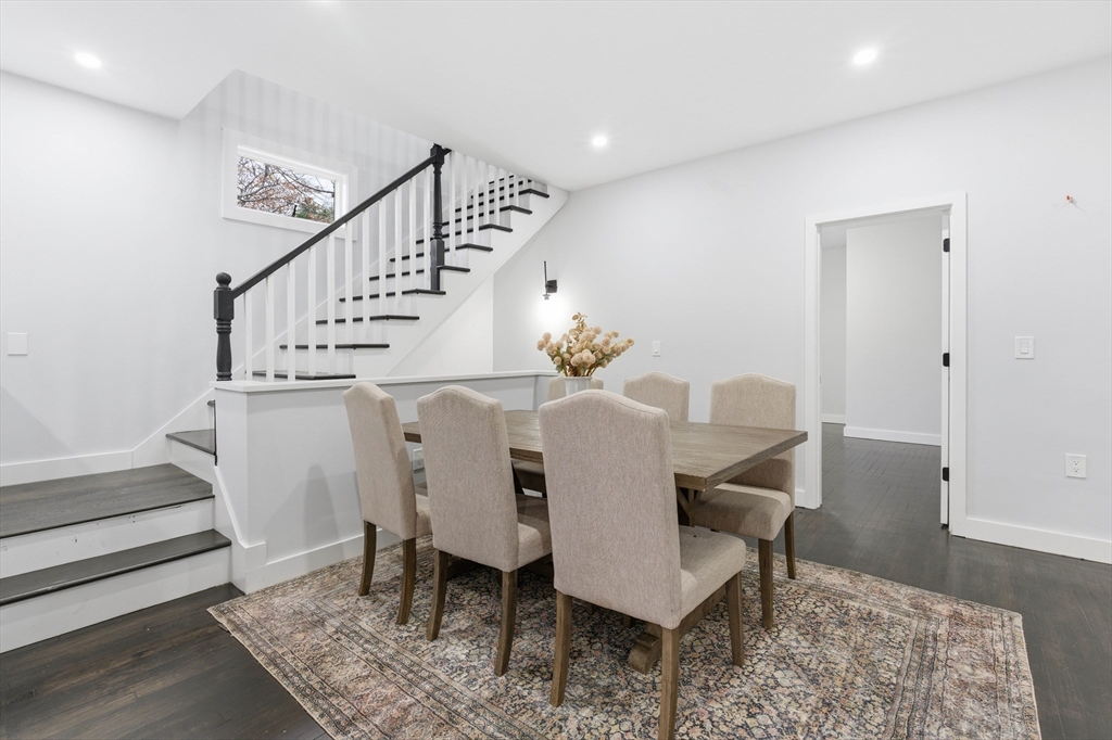 288 Grove Street, Unit 288 Clinton, MA 01510 - Photo 14 of 37 a view of a dining room with furniture and wooden floor