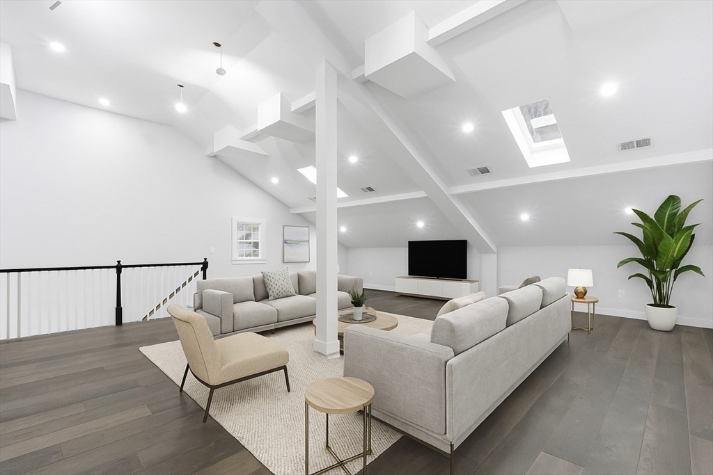 288 Grove Street, Unit 288 Clinton, MA 01510 - Photo 19 of 37 a living room with furniture and a flat screen tv