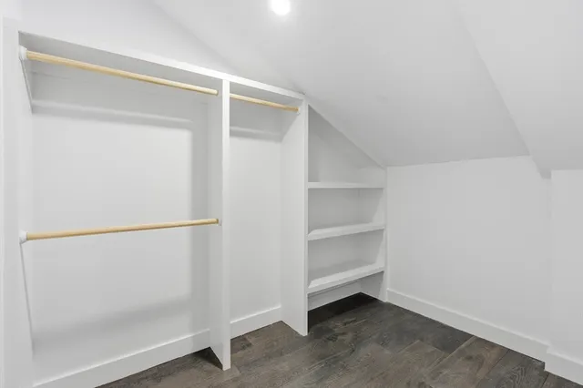 a view of an empty walk in closet
