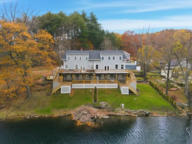 a view of a town with mountains in the background