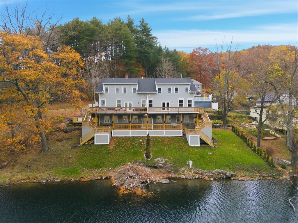 288 Grove Street, Unit 288 Clinton, MA 01510 - Photo 3 of 37 a view of a town with mountains in the background