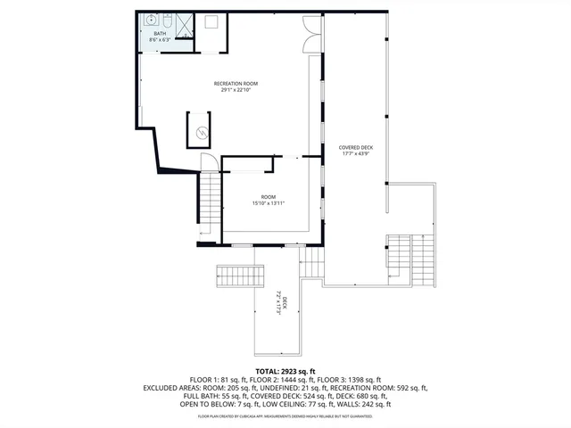 a black and white photo of a bench