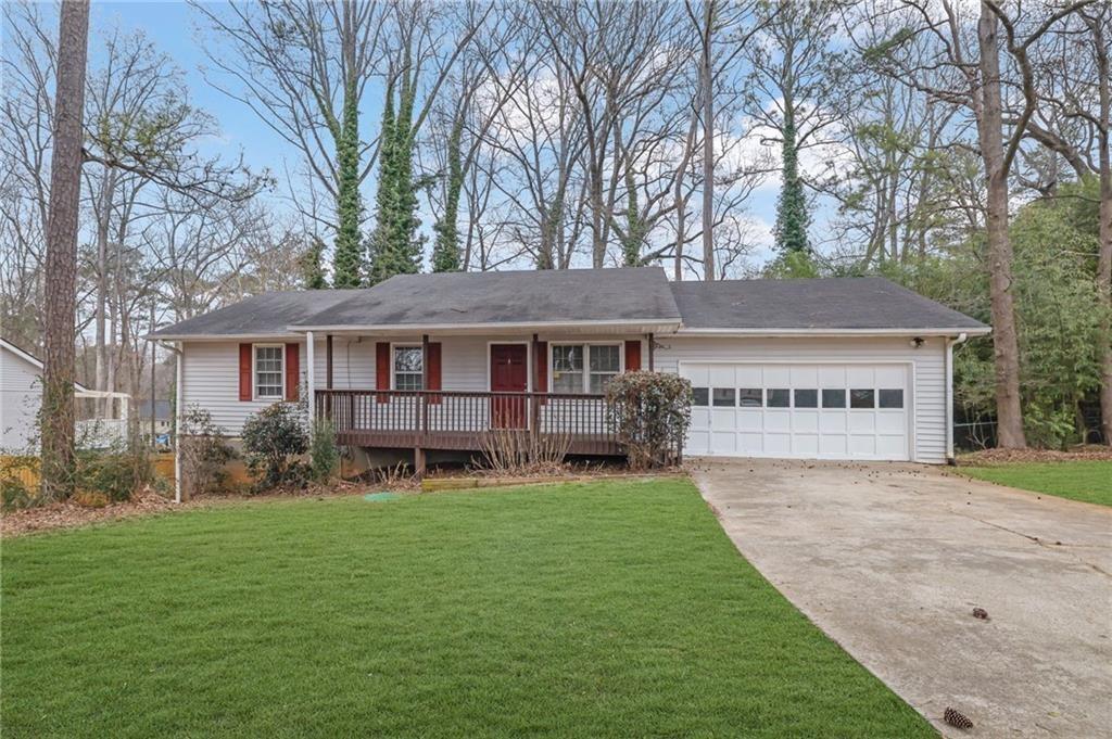 4179 White Road Southwest Snellville, GA 30039 - Photo 1 of 1 front view of a house with a yard