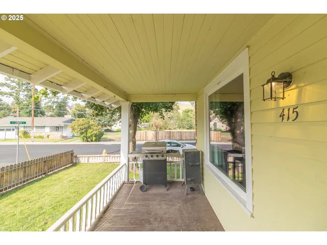 a kitchen with stainless steel appliances a sink and cabinets