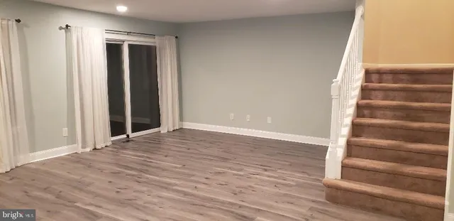 a front view of a building with large windows