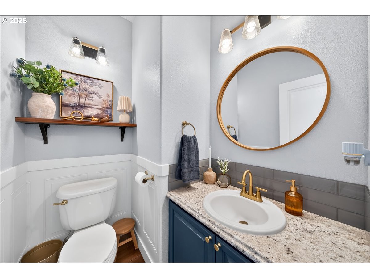 28311 Northwest Nowakowski Road Buxton, OR 97109 - Photo 19 of 48 a bathroom with a toilet a sink and a mirror