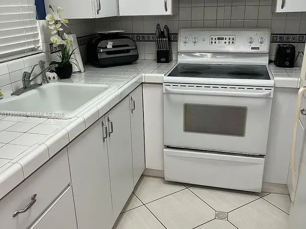 $230,000 | 6620 West 2nd Court, Unit 407, Hialeah, FL 33012