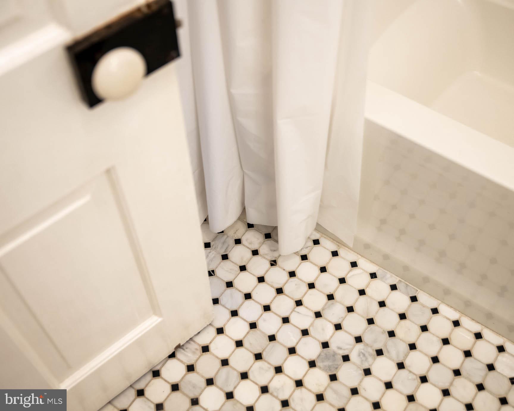 810 Crum Creek Road Media, PA 19063 - Photo 18 of 58 Hand laid marble flooring in hall bathroom