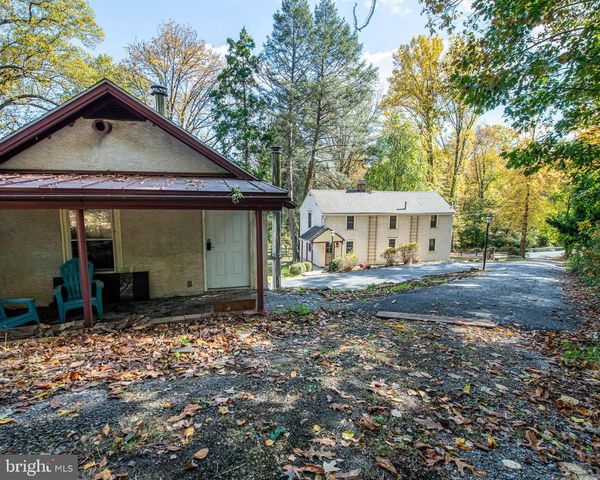 a view of a house with a street