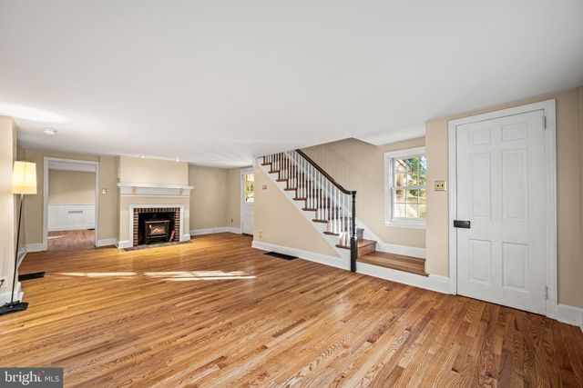 a living room with a fireplace
