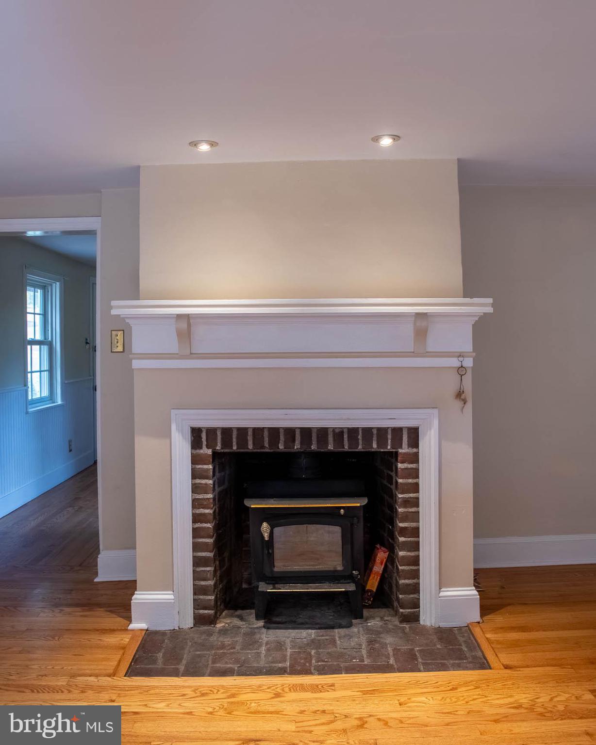 810 Crum Creek Road Media, PA 19063 - Photo 10 of 58 Fireplace sets the stage for seating area