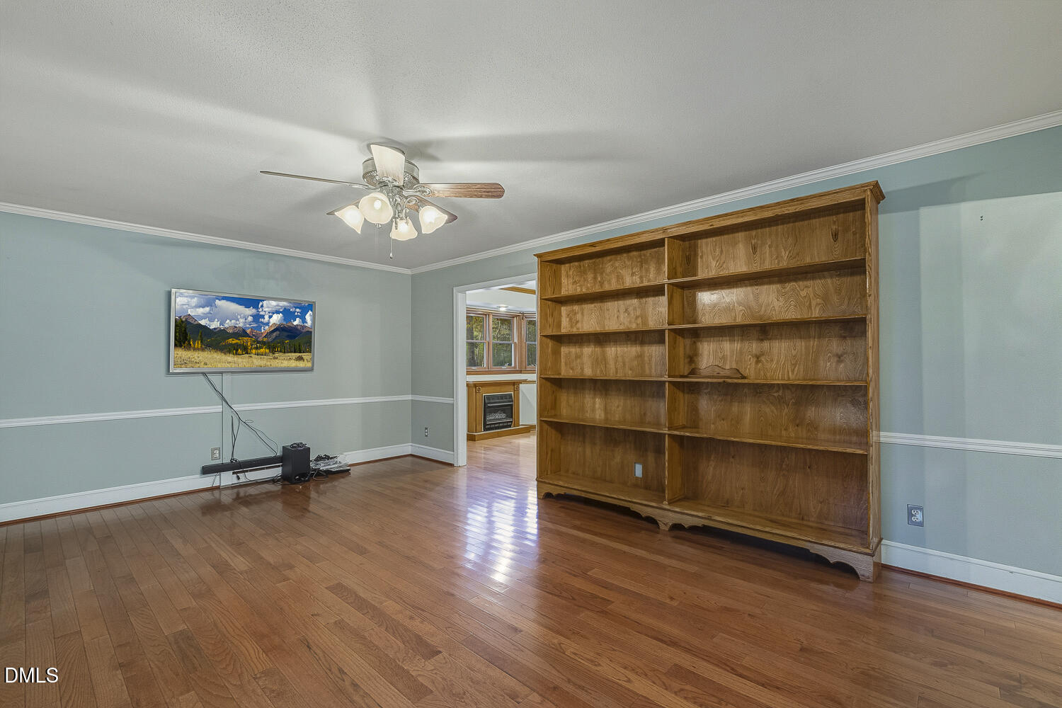 120 Elf Way Pittsboro, NC 27312 - Photo 15 of 68 a view of a room with wooden floor and a ceiling fan