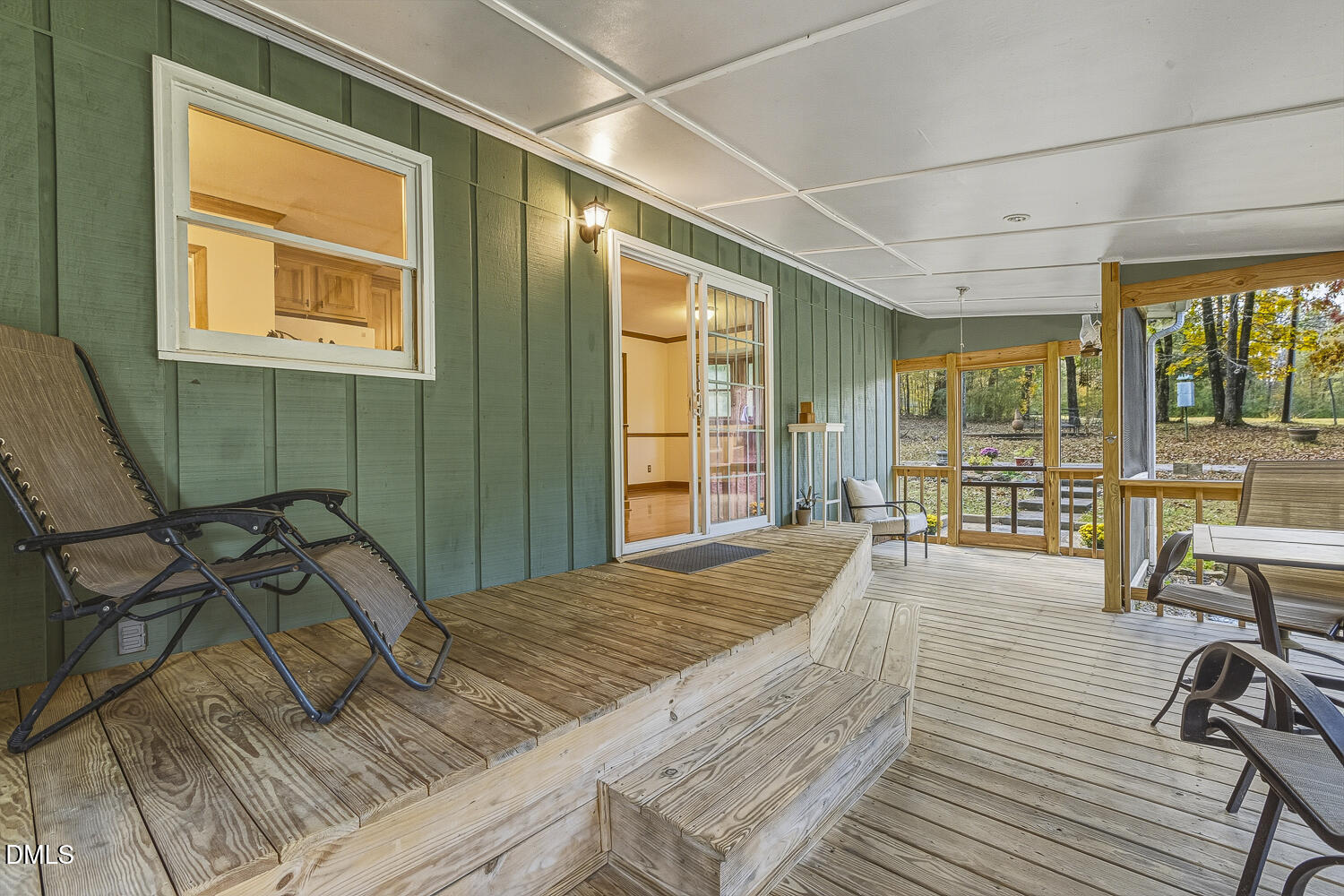 120 Elf Way Pittsboro, NC 27312 - Photo 43 of 68 a bedroom with a bed a table and large windows