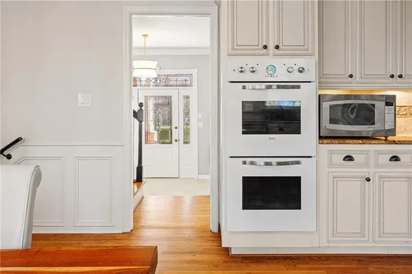 a bathroom with a sink vanity and a mirror
