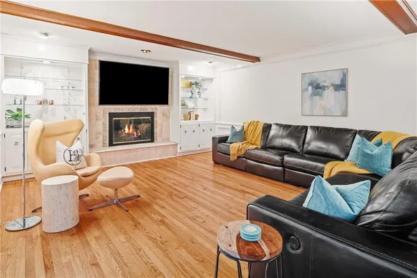 a bedroom with a bed furniture and wooden floor
