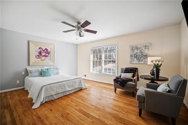 a view of staircase with white walls and a window
