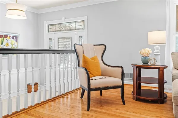 a view of a dining room with furniture window and wooden floor