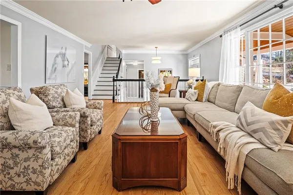 a white stove top oven sitting inside of a kitchen