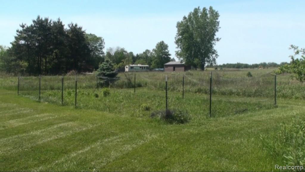 2136 Granger Road Oxford, MI 48371 - Photo 84 of 95 Fenced garden and neighbor to the east