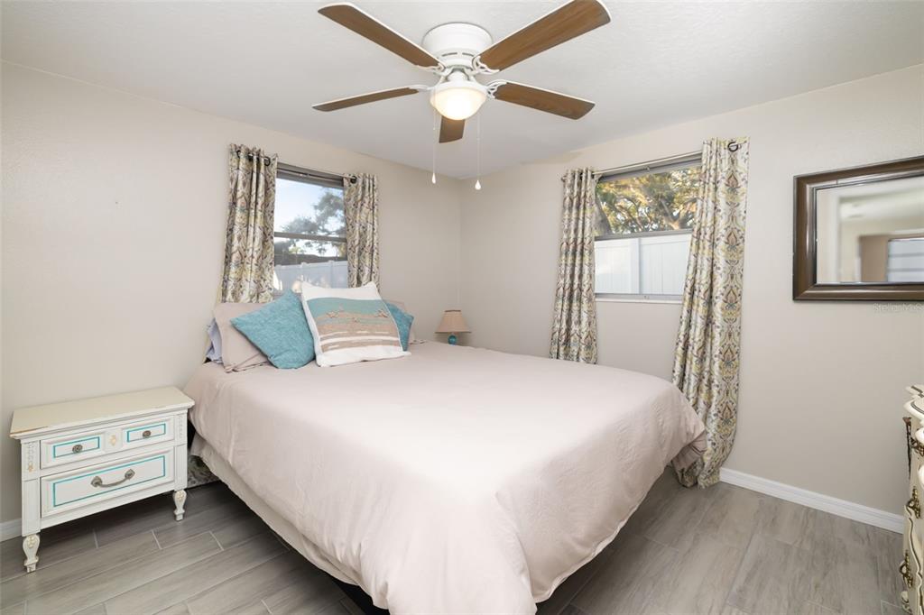 410 Pameto Road Nokomis, FL 34275 - Photo 28 of 40 a bedroom with a bed and a window