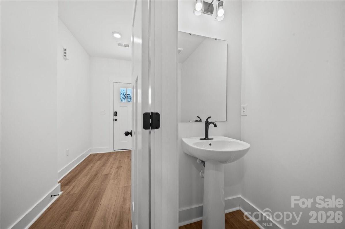 49 Moon Hvn Way Arden, NC 28704 - Photo 12 of 30 a bathroom with a sink and a mirror