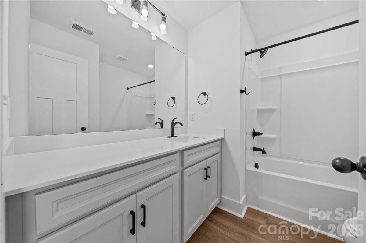 49 Moon Hvn Way Arden, NC 28704 - Photo 22 of 30 a bathroom with a bathtub and a sink