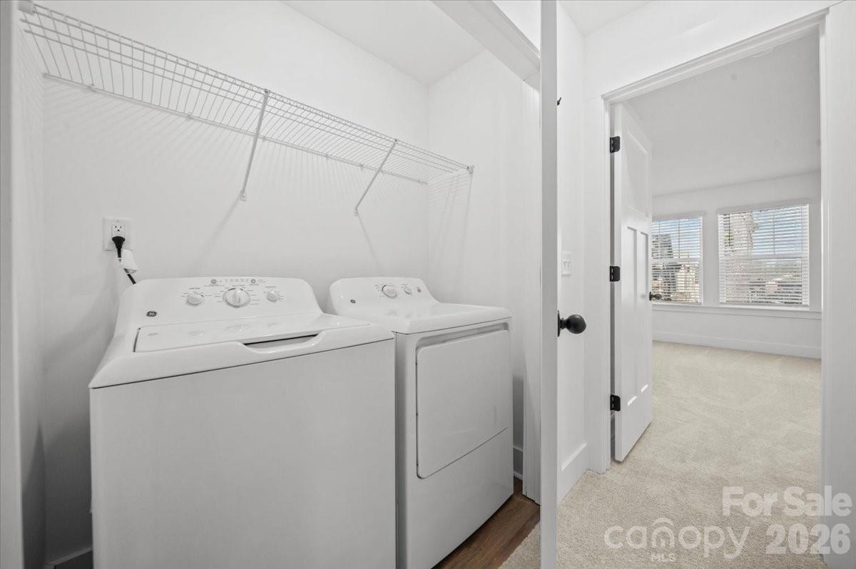 49 Moon Hvn Way Arden, NC 28704 - Photo 23 of 30 a utility room with dryer and washer