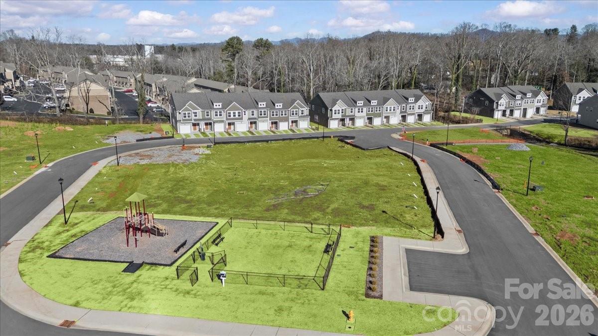 49 Moon Hvn Way Arden, NC 28704 - Photo 28 of 30 a view of a swimming pool with a garden