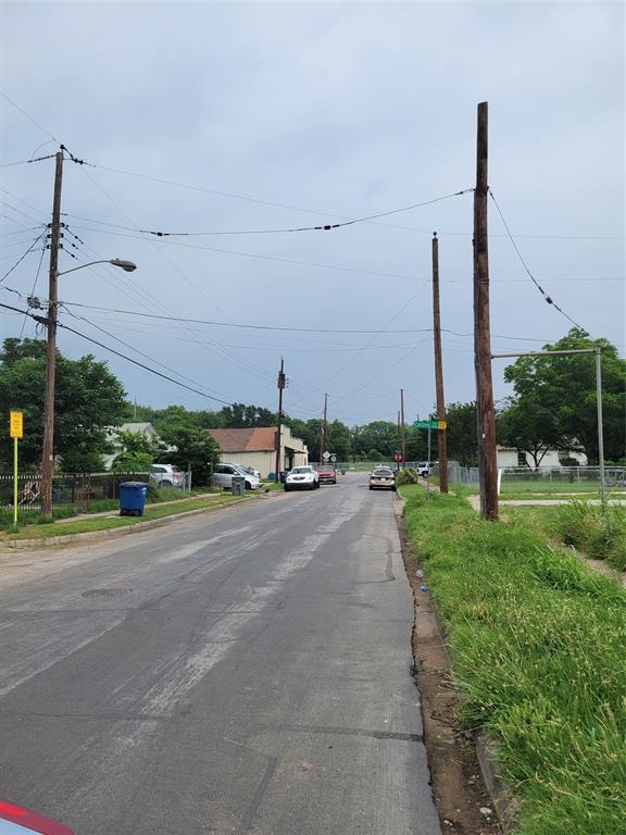 4719 Collins Avenue Dallas, TX 75210 - Photo 3 of 5 a view of a city with tall buildings