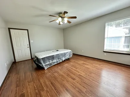 a bathroom with a double vanity sink a and a mirror