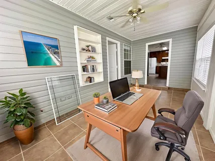a view of a hallway with windows