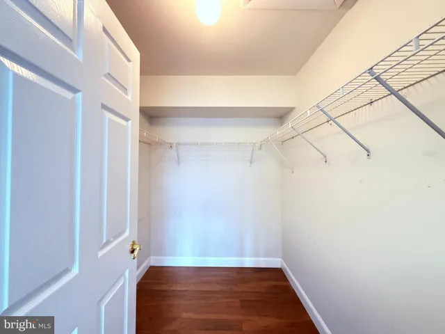 a view of room with racks on the wall