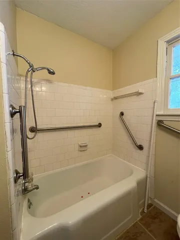 a bathroom with a bathtub