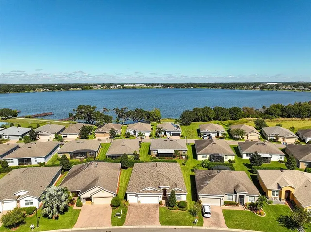 an aerial view of a building with seating space
