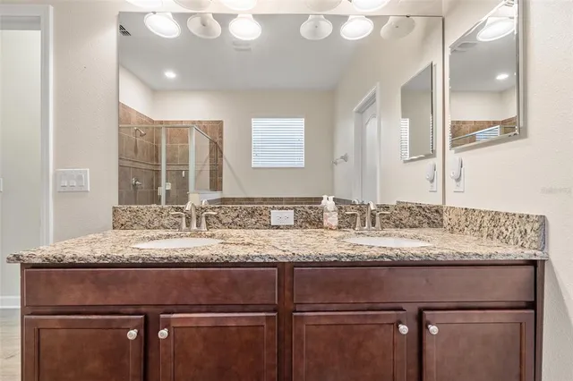 a outdoor dining space with furniture and garden view
