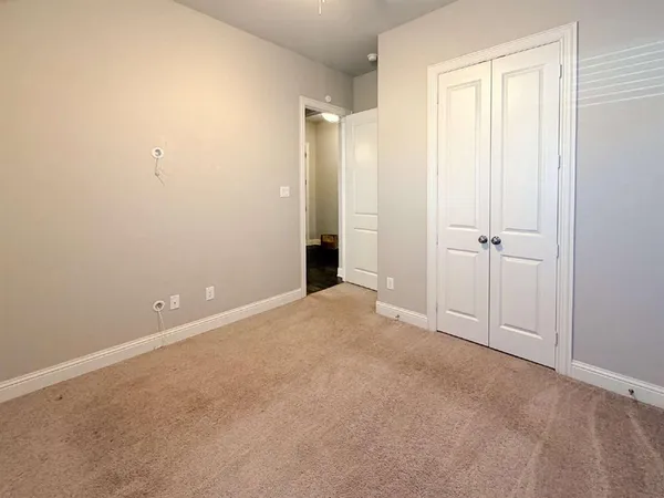 an empty room with an entryway