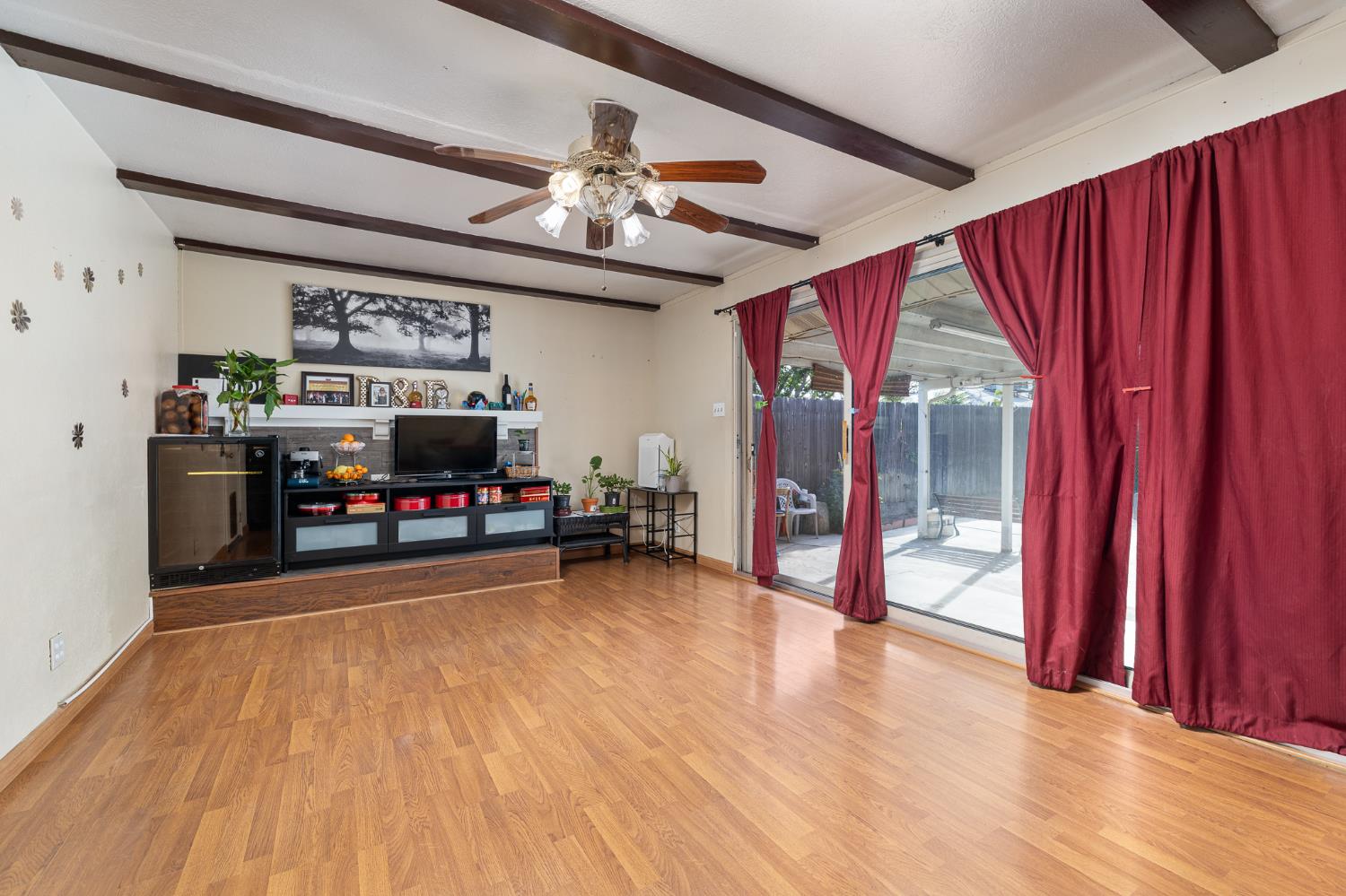 4683 North Angus Street Fresno, CA 93726 - Photo 13 of 27 a view of a livingroom with furniture window and wooden floor