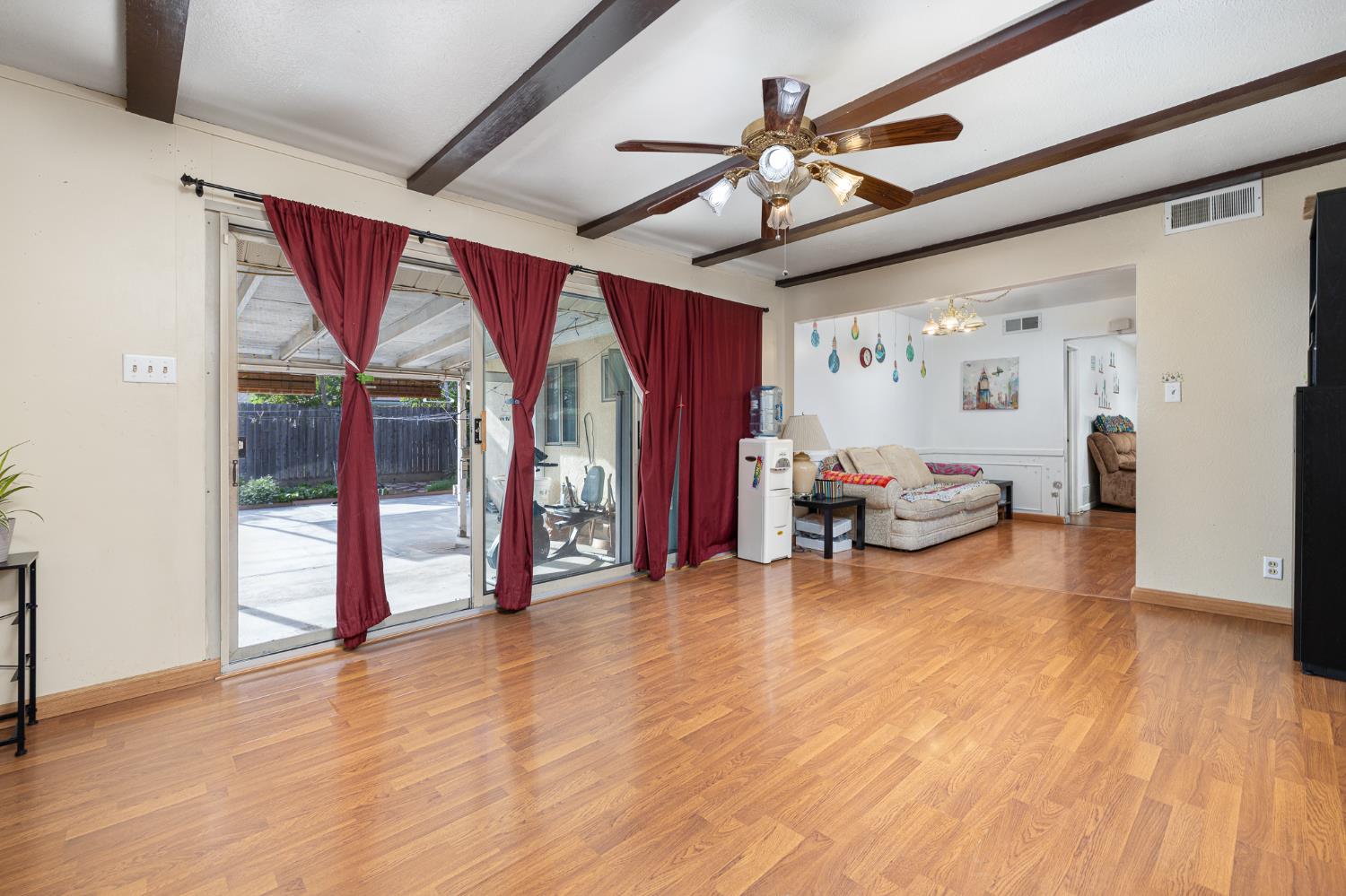 4683 North Angus Street Fresno, CA 93726 - Photo 14 of 27 a view of a livingroom with furniture and a ceiling fan