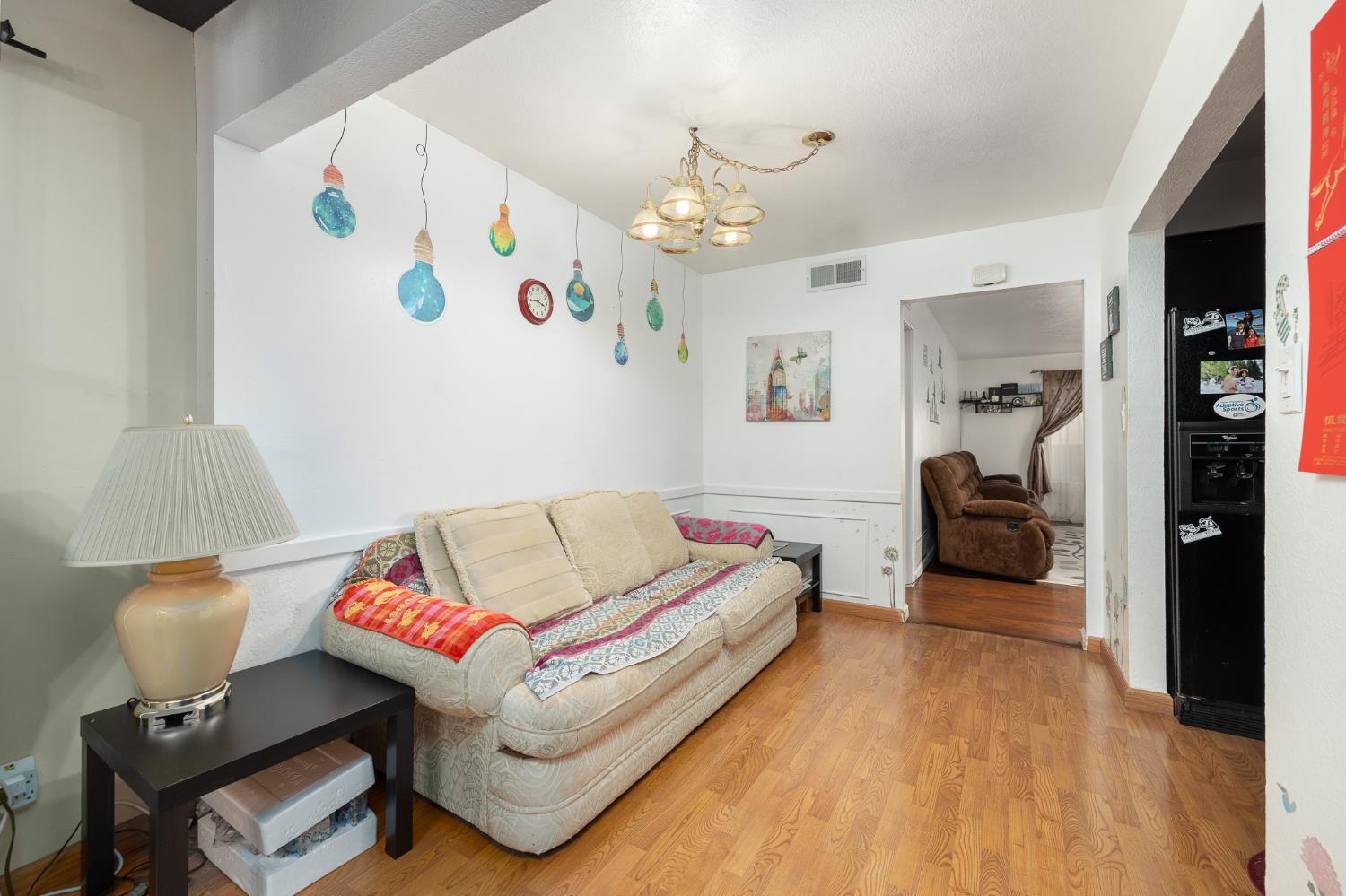 4683 North Angus Street Fresno, CA 93726 - Photo 8 of 27 a living room with furniture and a flat screen tv