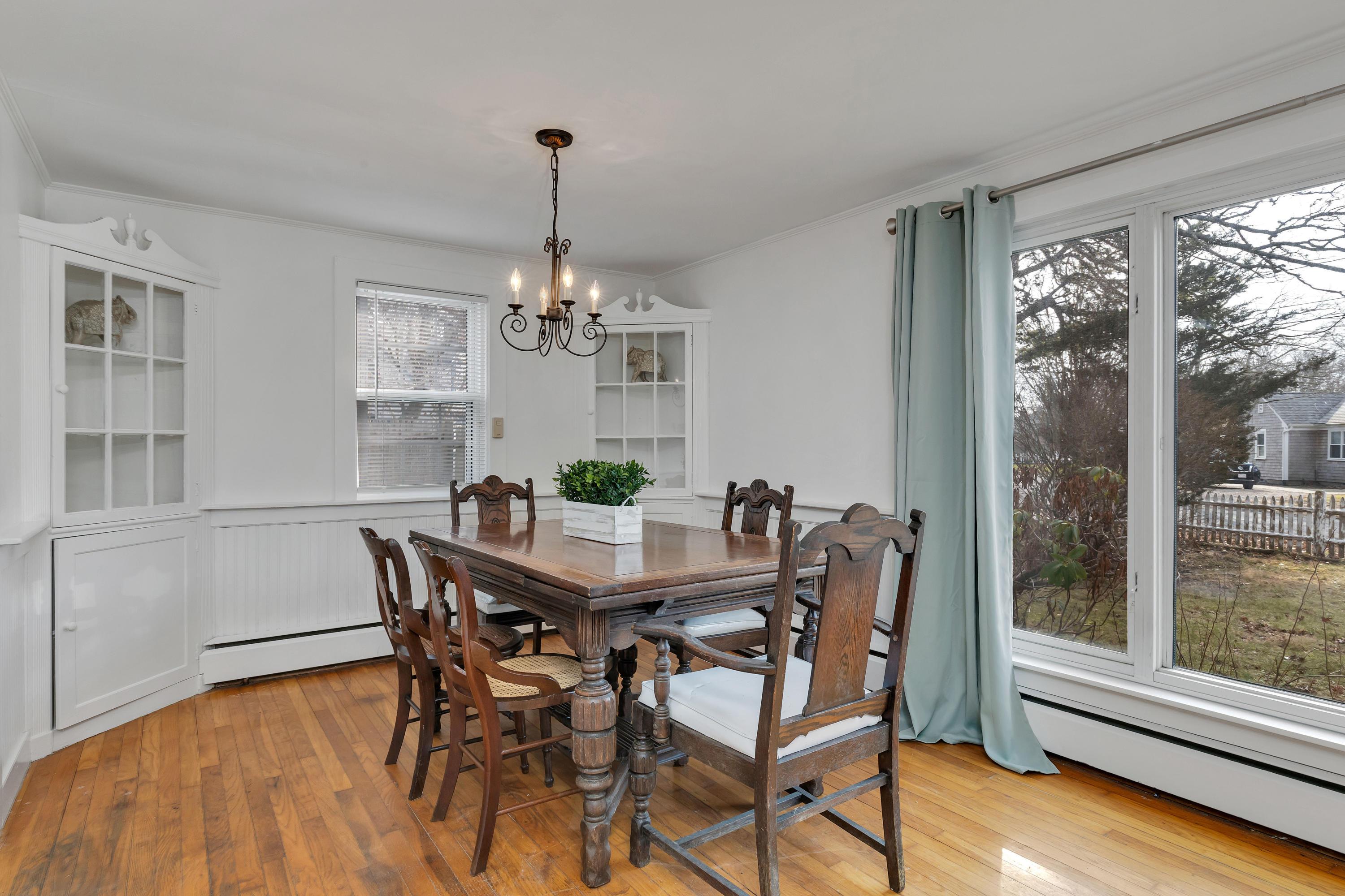 54 Murphy Road Hyannis, MA 02601 - Photo 6 of 24 a view of a dining room with furniture window and wooden floor