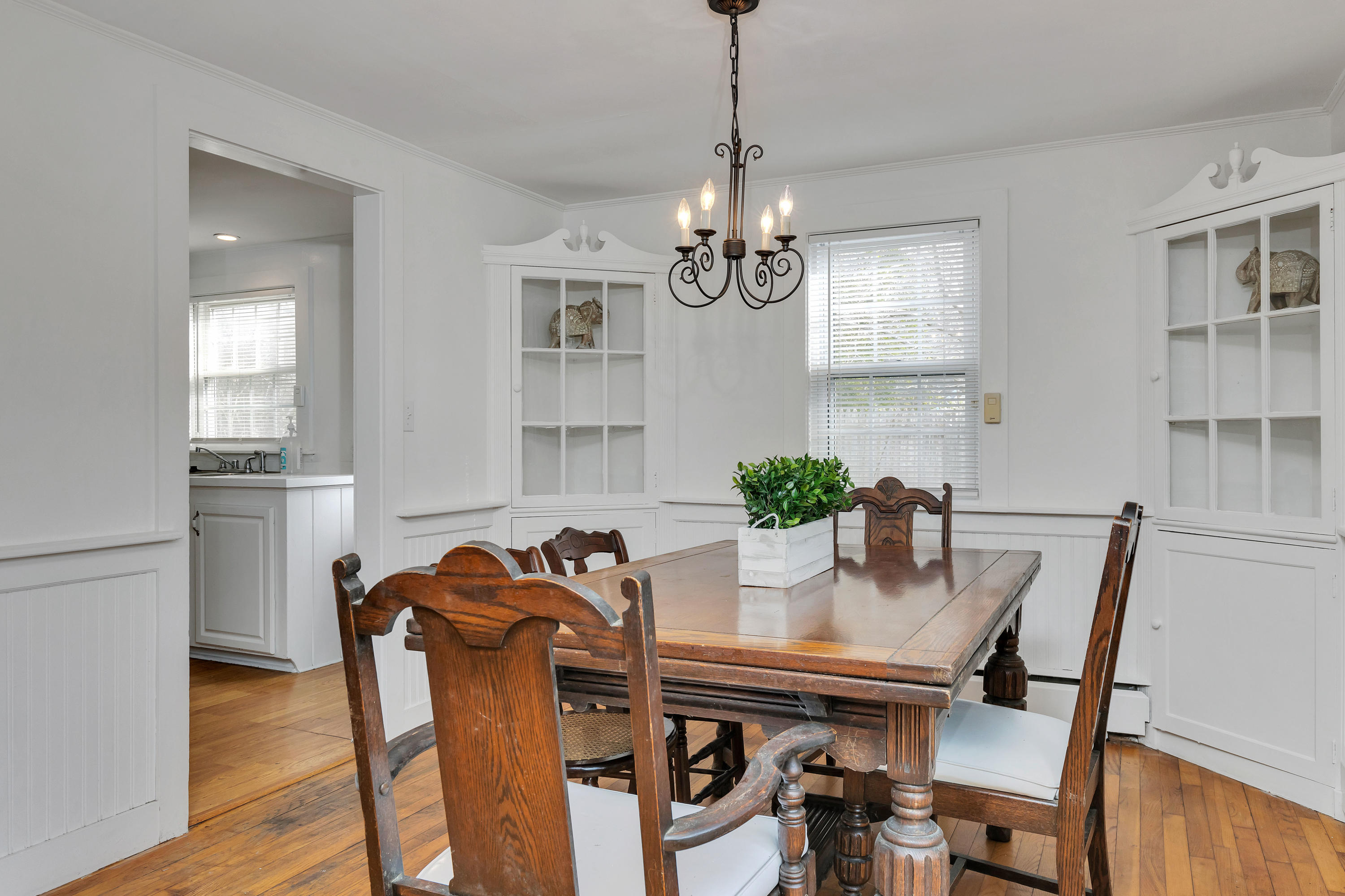 54 Murphy Road Hyannis, MA 02601 - Photo 8 of 24 a view of a dining room with furniture window and wooden floor