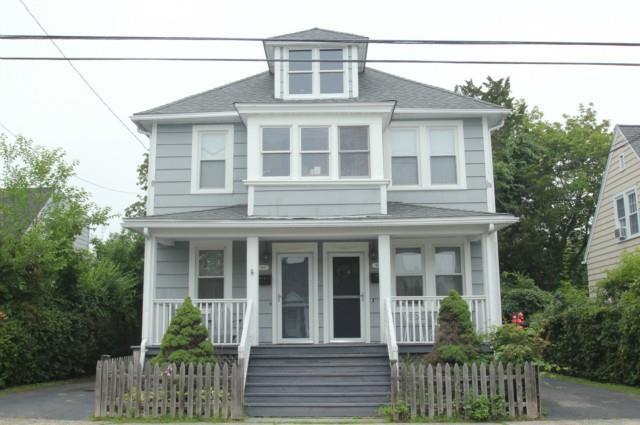 510 Riverside Drive Fairfield, CT 06824 - Photo 1 of 1 a front view of a house with a garden