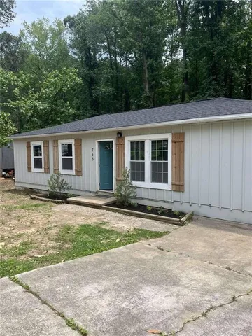 a view of a house with a patio